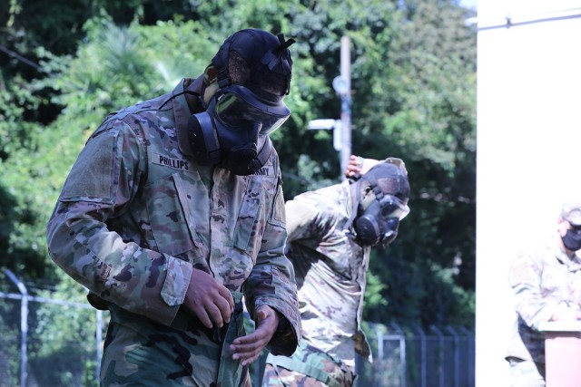 Sgt. Damonte Phillips, assigned to 35th Combat Sustainment Support Battalion, competes in the Chemical, Biological, Radiological and Nuclear Lane portion of the unit’s first ever battalion-level “Best Warrior” competition Sept. 29 at Camp...