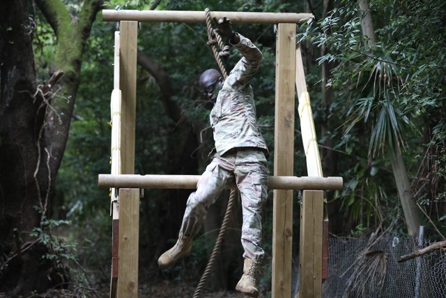 Spc. Gaya Gaya, assigned to 35th Combat Sustainment Support Battalion, competes in the obstacle course portion of the unit’s first ever battalion-level “Best Warrior” competition Sept. 30 at Camp Zama, Japan.