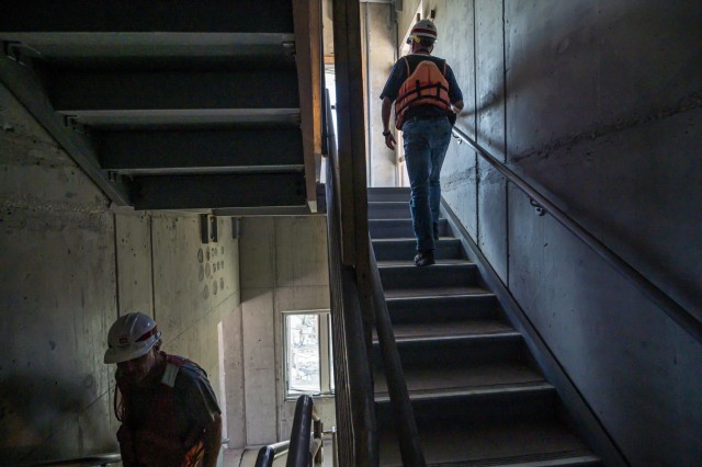 Kirk McWilliams and Shawn Soltis, resident and field engineers for the U.S. Army Corps of Engineers Pittsburgh District, climb up the control tower at Charleroi Locks and Dam on the lower Monongahela River in Pennsylvania, Sept. 30, 2021. The...