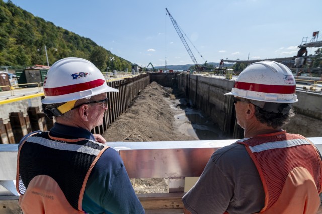 Kirk McWilliams and Shawn Soltis, resident and field engineers for the U.S. Army Corps of Engineers Pittsburgh District, stand over the construction project at Charleroi Locks and Dam on the lower Monongahela River in Pennsylvania, Sept. 30, 2021....