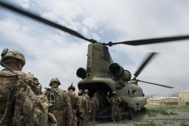 Soldiers entering Army Chinook helicopter