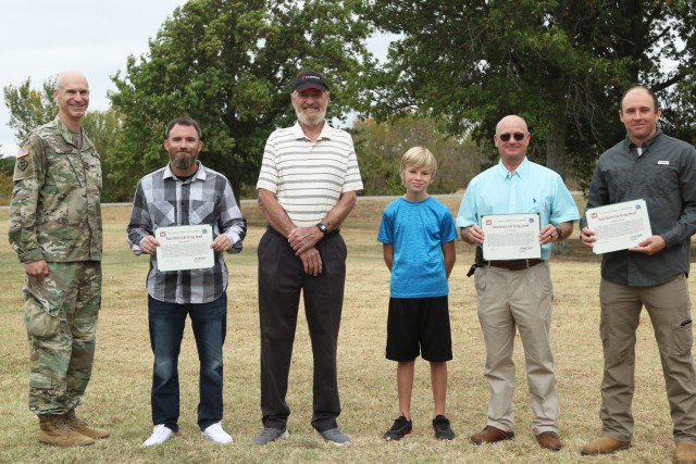 Col. Scott Preston, Tulsa District, U.S. Army Corps of Engineers Commander stands with Sean Smethers,  Harold Gray, Grayson Carr, Lake Manager,Peat Robinson and Assistant Lake Manager Dakota Allison.  Col. Preston presented  Smethers, Robinson and...