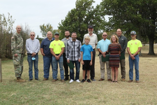 Col. Scott Preston, Tulsa District, U.S. Army Corps of Engineers Commander stands with Kaw Lake office staff, volunteers and civilians who were involved in helping rescue boaters in a sinking vessell on Kaw Lake on Sept. 13.  Persons on the...