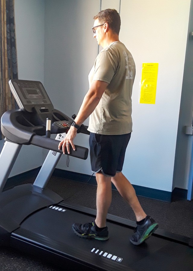 Nick Osterhaus, Wellness program specialist, U.S. Army Sustainment Command, trains on the treadmill during his Civilian Fitness and Health Promotion Program time on Sept. 28. (Photo by Linda Ottman, G1 Division, ASC.)