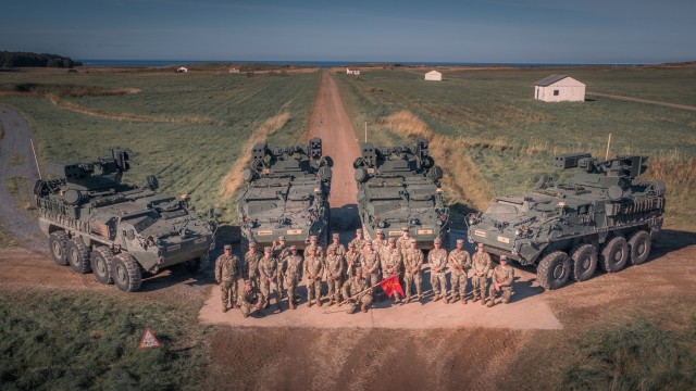 Crews from Alpha Battery, 5-4 ADAR pose with their Maneuver Short Range Air Defense systems after successfully completing the first live-fire of M-SHORAD at the tactical unit level and the first-ever live-fire of the system in Europe on Oct. 7, 2021. The week-long training took place at the Putlos Bundeswehr range on the Baltic Sea coast of Germany. (U.S. Army photo by Maj. Robert Fellingham)