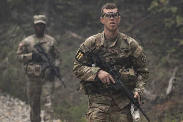 Sgt. Adam Krauland, a cryptologic analyst assigned to U.S. Army Pacific, patrols an area during the casualty evacuation mission as part of the Army Best Warrior Competition, Oct. 4, 2021, at Fort Knox, Ky. Krauland won the Army&#39;s NCO of the Year award during a ceremony at the Association of the U.S. Army Annual Meeting and Exposition in Washington, D.C., Oct. 11, 2021.