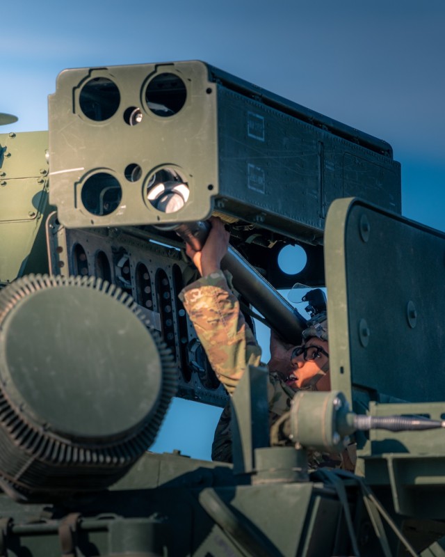 A Soldier from Alpha Battery, 5-4 ADAR, loads a Stinger missile into pod on his Maneuver Short Range Air Defense system in preparation for the first live-fire of M-SHORAD at the tactical unit level and the first-ever live-fire of the system in Europe on Oct. 7, 2021. The week-long training took place at the Putlos Bundeswehr range on the Baltic Sea coast of Germany. (U.S. Army photo by Maj. Robert Fellingham)