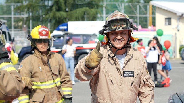 Michael Champaco, USAG Daegu Fire and Emergency Services Training Chief, gives the thumbs up before a vehicle extraction demonstration. The event was just one of many hosted by USAG Daegu Emergency Services during an open house on October 9th, 2021.