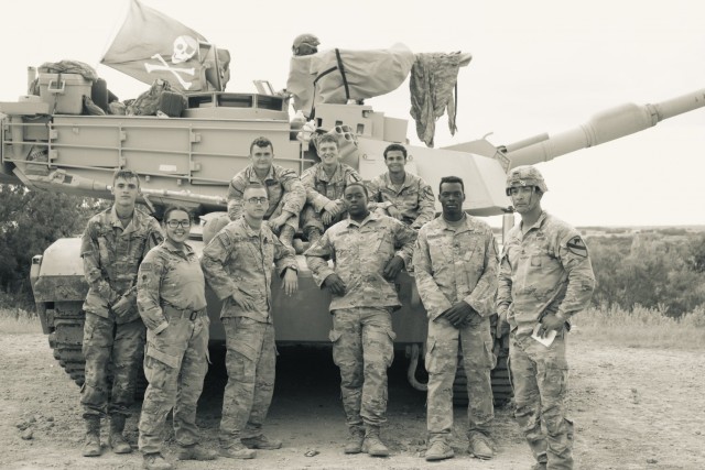Company A, 3rd Armored Brigade Combat Team, 1st Cavalry Division Soldiers pose for a photo at the range at Fort Hood, Texas, July 21, 2021. Spc. Cinthia Ramirez is the only female captured in the photo and part of the first wave of females to join a combat MOS in her unit. (Courtesy photo)