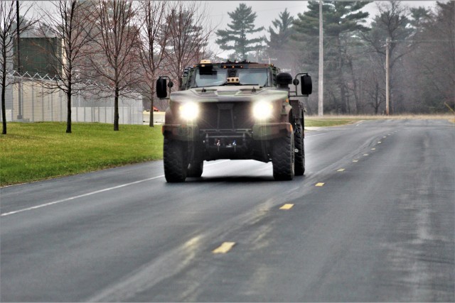 Soldiers drive a Joint Light Tactical Vehicle (JLTV) through the cantonment area April 23, 2020, at Fort McCoy, Wis. The JLTV family of vehicles is designed to restore payload and performance that were traded from light tactical vehicles to add...