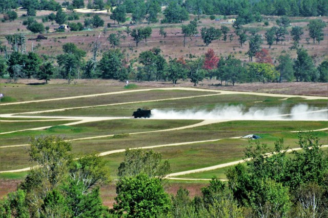 Fort McCoy Range Maintenance personnel are shown Sept. 23, 2021, constructing a fire and movement range on Range 4 at Fort McCoy. The smaller range is 100 meters wide by 150 meters long. The new range also is designed for training individual...