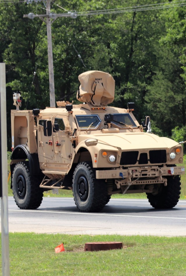 Personnel drive a Joint Light Tactical Vehicle (JLTV) through the cantonment area July 1, 2021, at Fort McCoy, Wis. The JLTV family of vehicles is designed to restore payload and performance that were traded from light tactical vehicles to add...