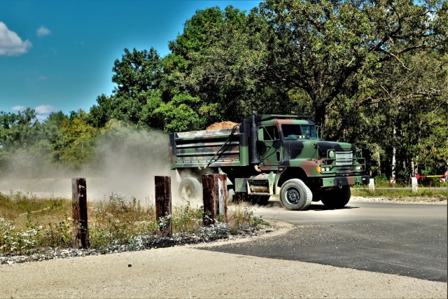 Fort McCoy Range Maintenance personnel are shown Sept. 23, 2021, constructing a fire and movement range on Range 4 at Fort McCoy. The smaller range is 100 meters wide by 150 meters long. The new range also is designed for training individual...