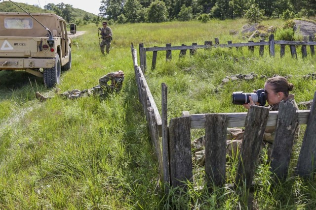 Staff Sgt. Sarah Zaler, 326th Mobile Public Affairs Detachment public affairs mass communications noncommissioned officer, takes a photos at Combat Support Training Exercise 78-21-04 on Aug. 12, 2021 at Fort McCoy, Wisconsin. CSTX will enable Army...