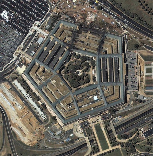Seen is an aerial view of the Pentagon, home of the Department of Defense in Washington, D.C., after a hijacked airline crashed into it on Sept. 11, 2001.  Terrorists hijacked four commercial jets and then crashed them into the World Trade Center...