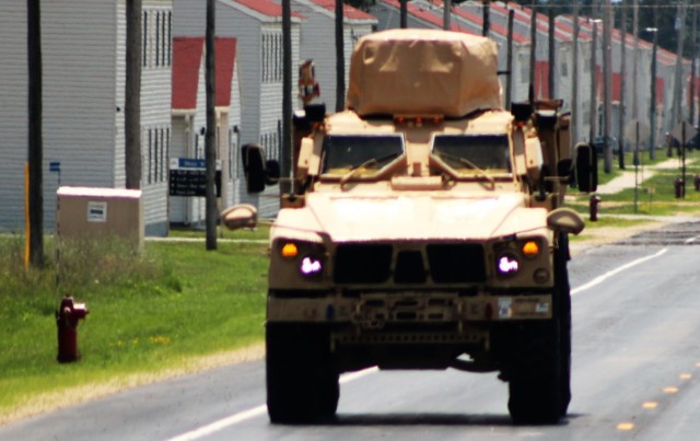 Personnel drive a Joint Light Tactical Vehicle (JLTV) through the cantonment area July 1, 2021, at Fort McCoy, Wis. The JLTV family of vehicles is designed to restore payload and performance that were traded from light tactical vehicles to add...