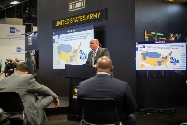 Dr. Douglas Matty, Army Futures Command Artificial Intelligence Integration Center (AI2C), speaks to the audience at an AUSA 2021 on how AI2C is supporting the DOD’s Joint Artificial Intelligence Center & serves as an integrator for various AI science, technology & developmental engineering efforts distributed across the Army Modernization Enterprise 
