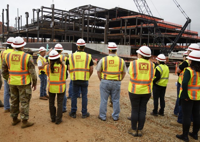 Mark French, the U.S. Army Corps of Engineers’ chief of quality assurance for the new hospital construction project here, speaks with the 12 civilians participating in the USACE Kansas City District Leader Development Program Oct. 7 during a...
