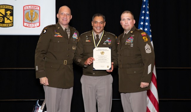 Gen. Michael Garrett, an Army ROTC alumnus of Xavier University, is awarded for his years of service to Army ROTC at the 2021 AUSA Conference in Washington, Oct. 11, 2021. Garrett was honored as a 2021 Army ROTC Hall of Fame inductee. | Photo by Kyle Crawford, USACC Public Affairs