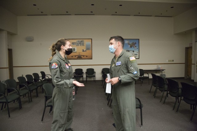 U.S. Air Force Staff Sgts. Mary Suchocki, an Air Force Reserve loadmaster assigned to the 728th Airlift Squadron here, and Chandler Smith, an Air Force Reserve loadmaster assigned to the 97th Airlift Squadron here, talks after receiving the...