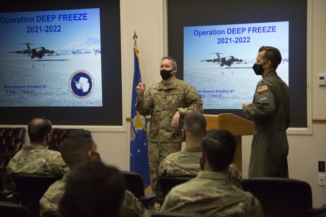 U.S. Air Force Lt. Col. Brandon Tellez, the Antarctic mission commander and 62nd Operations Group deputy commander, briefs crew members for the upcoming Operation Deep Freeze 2021-2022 main season, Sept. 15, 2021 at Joint Base Lewis-McChord, Washington. The ODF main season runs annually, from August through July. This timeframe allows research teams and partnered entities the safest and most efficient method of accomplishing their joint goals. (U.S. Air Force photo by Mr. Edzel L. Butac)