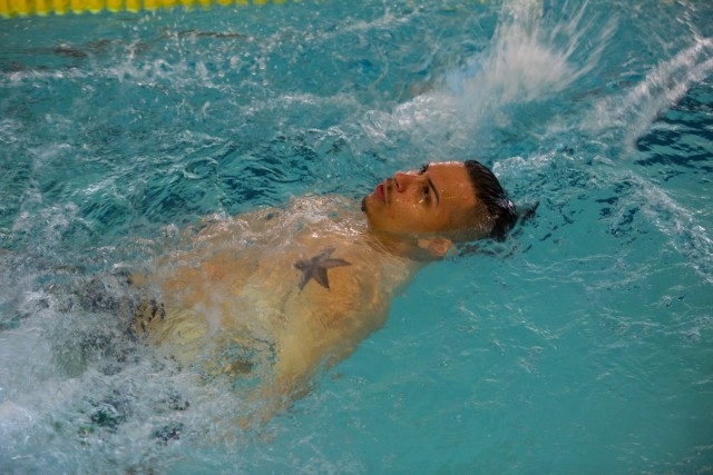 Retired U.S. Army Staff Sgt. Joel Rodriguez, formerly assigned to Warrior Transition Battalion, Fort Benning, Georgia, trains for the swimming event at Fort Bliss, Texas, Feb. 28, 2018. 74 wounded, ill, or injured active duty Soldiers and veterans participate in a series of events that are held at Fort Bliss, Texas, Feb. 27 through March 9, 2018 as the Deputy Chief of Staff, Warrior Care and Transition host the 2018 U.S. Army Trials (U.S. Army photo by Spc. Nathanael Mercado)