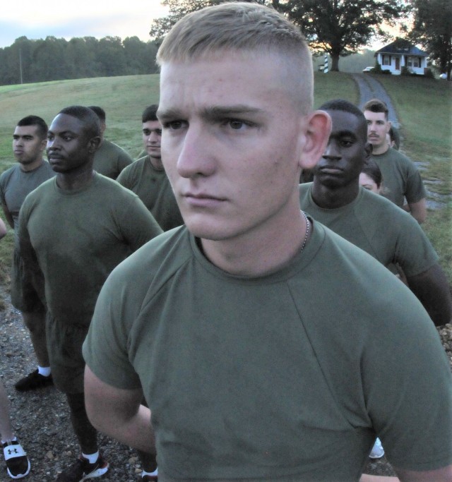Marines await movement orders after completing warmups prior to the annual Lt. Gen. Lewis Burwell “Chesty” Puller Run Oct. 13 in Saluda.