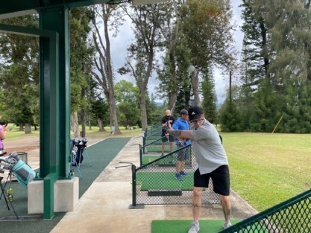 Spc. Joey Mackrell worked on his swing during a Golf Skills class at the Leilehua Golf Course in May. The Schofield Barracks Soldier Recovery Unit, Hawaii, offers the class. (Photo courtesy of Carol Hickman)