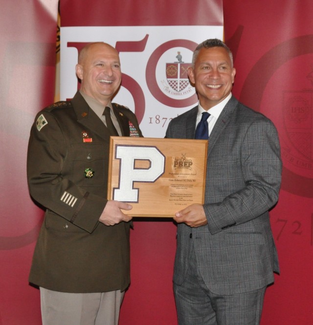 Gen. Ed Daly, commander of the Army Materiel Command, receives an honorary plaque from Dr. Michael Gomez, president of St. Peter’s Preparatory School in Jersey City, N.J. Daly was inducted into the St. Peter’s Prep Hall of Fame on Oct. 14 in...