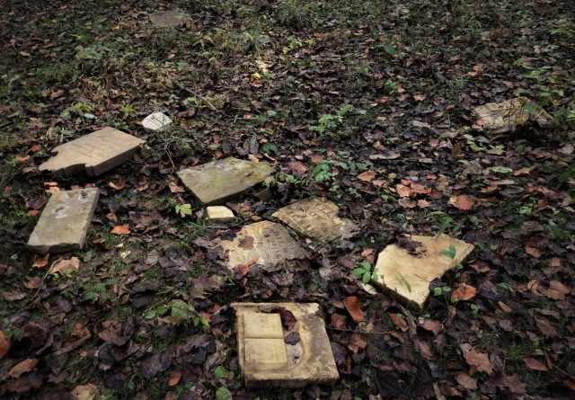 A group of headstones lay as they were found in the Rahm/Davis Cemetery when archeologists rediscovered them in January, 2021.