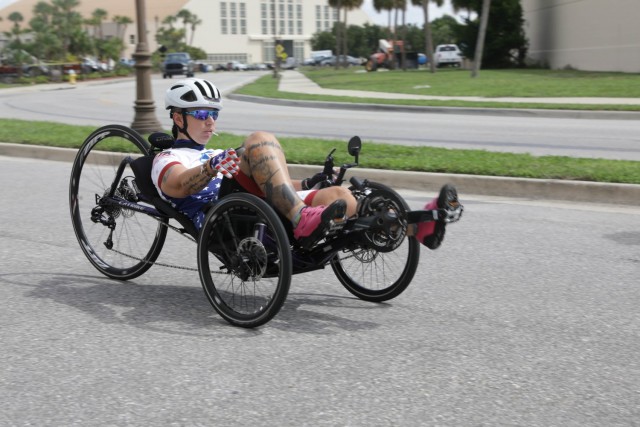 U.S. Army veteran Beth King attends athlete training for the cycling event, June 17, 2019, at MacDill Airforce Base, during the 2019 Department of Defense Warrior Games. The DoD Warrior Games are conducted June 21 - 30, hosted by Special Operations Command, Tampa, Florida. It is an adaptive sports competition for wounded, ill and injured service members and veterans. Approximately 300 athletes representing teams from the Army, Marine Corps, Navy, Air Force, Special Operations Command, United Kingdom Armed Forces, Australian Defense Force, Canadian Armed Forces, Armed Forces of the Netherlands, and the Danish Armed Forces will compete in archery, cycling, shooting, sitting volleyball, swimming, track, field, wheelchair basketball, indoor rowing, powerlifting, and for the first time in Warrior Games history, golf, wheelchair tennis, wheelchair rugby, and mountain biking. (U.S. Army photo by Spc. Seara Marcsis)