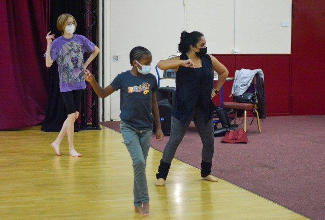 Marissa E. Blake from USAG Italy&#39;s Soldiers&#39; Theatre leads the Youth Jazz Dance Workshop.