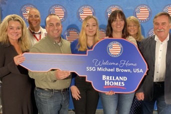 Wounded warrior receives new home during concert