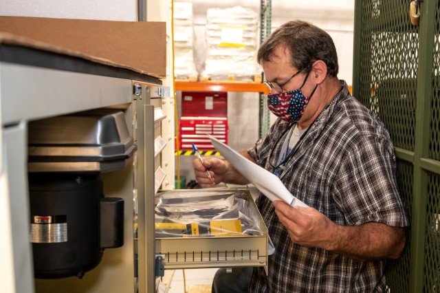Sheet Metal Mechanic Paul Dick inventories equipment in an Armament Repair Shop Set.  The ARSS system is a one-sided expandable repair shop shelter, mounted on a 7.5-ton trailer transported by a 5-ton vehicle. The shelter contains a 10-kilowatt...