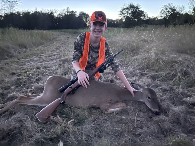 Andrew Dennis, age 12 from Union City, OK showing off his doe.