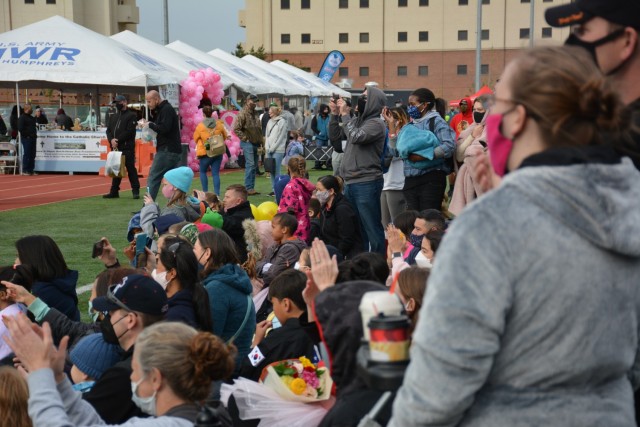 The Camp Humphreys community enjoys a performance the Camp Humphreys Child and Youth Services School of Knowledge, Inspiration, Exploration and Skills program during the Humphreys Festival Oct. 16, 2021. Service members, Families and community...