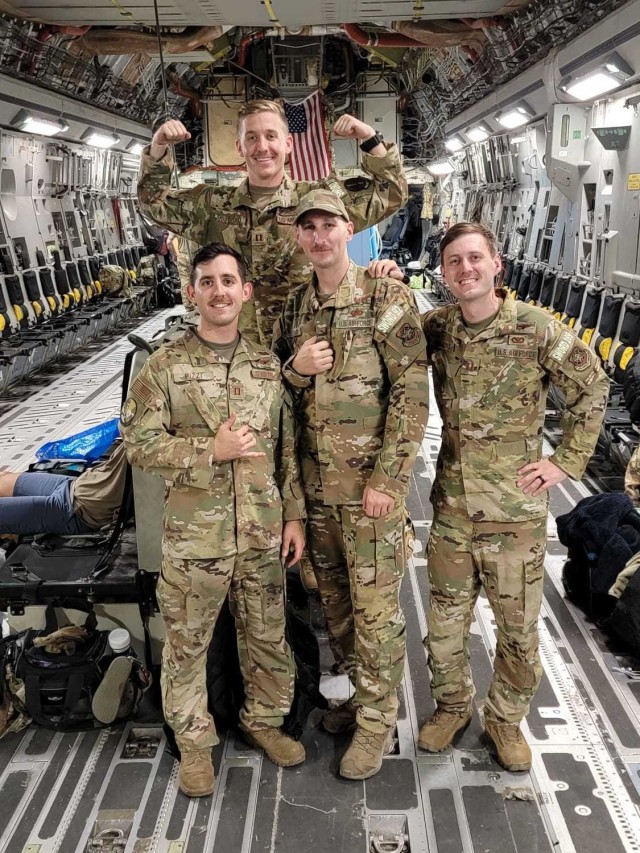 C-17 Globemaster III pilots and loadmasters with the 62nd Airlift Wing pose for a photo while supporting Operation Allies Refuge in August 2021. More than 124,000 people and more than five million pounds of cargo were airlifted out of Kabul, Afghanistan. (Courtesy Photo)