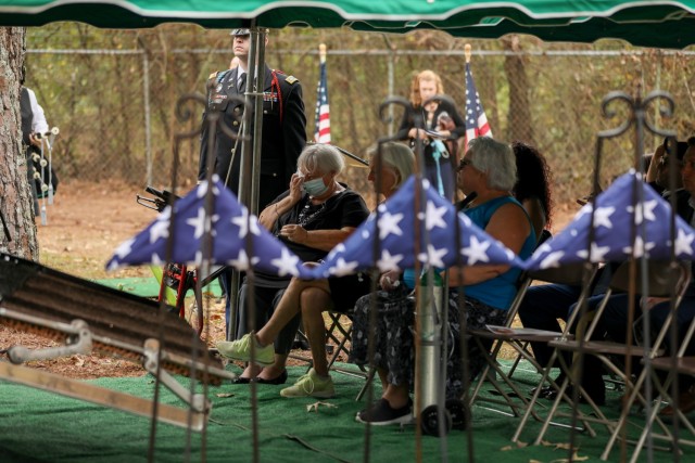 Family, friends, and community members gather to honor 1st Lt. James E. Wright during a graveside service at the Oakdale Cemetery in Lumber Bridge, North Carolina on Oct. 12, 2021. Wright, who had served with the NCNG’s 120th Infantry Regiment and grew up in Lumber Bridge, was killed in action in the vicinity of Dornot, France on Sept. 10, 1944. Wright was previously listed as missing in action until recently when his remains were identified through DNA testing. (U.S. Army Photo by Sgt. 1st Class Mary Junell)