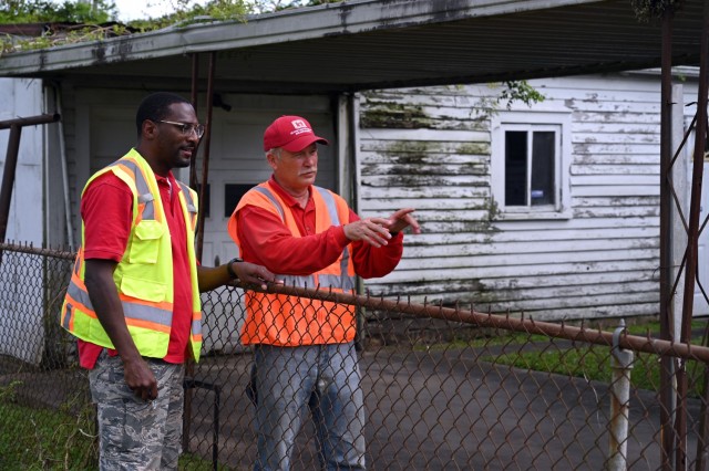 Richard Fisher, left, U.S. Army Corps of Engineers, Vicksburg District safety and occupational health specialist currently deployed to Louisiana in support of Hurricane Ida recovery efforts, and Rick Hart, Hurricane Ida quality assurance...