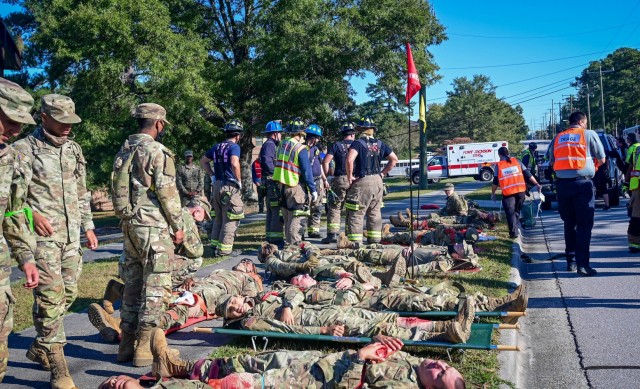 Fort Jackson, South Carolina, first responders and firefighters triage injured trainees during a mock tornado strike during a post-wide Full-scale Training Exercise on Oct. 19, 2021. Mock injured were placed in a row under the ‘immediate,’ or...