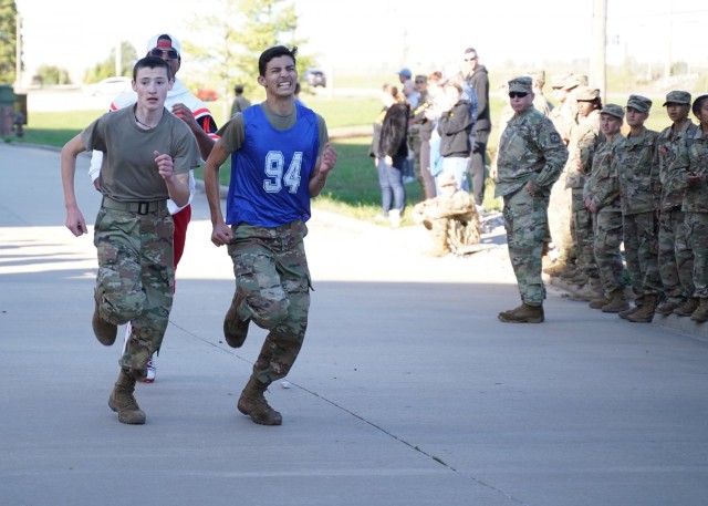 Junior ROTC cadets compete in a 1.5-mile foot race at the 31st Engineer Battalion training area Saturday during Raider Challenge.