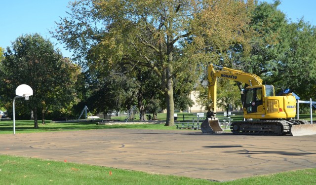 A bulldozer will soon demolish this basketball court and outdated playground equipment at Memorial Park on Rock Island Arsenal, Illinois. The area will be replaced with a dog park for use by the RIA community. The park is projected to be completed...