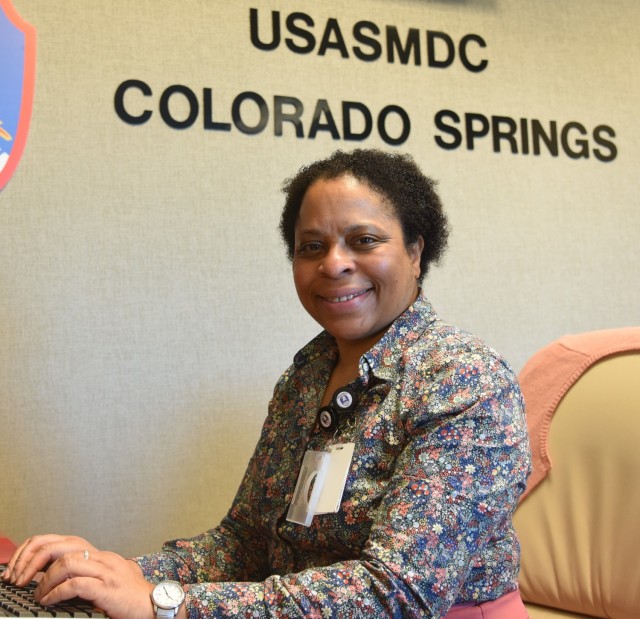 Dr. Alexia L. Gordon, special assistant to U.S. Army Space and Missile Defense Command’s deputy commanding general for operations, works in her office at Peterson Space Force Base, in Colorado Springs, Colorado. Gordon is in the position through the military’s Defense Senior Leader Development Program - one of several leader development programs for civilian talent management. (U.S. Army photo by Sgt. 1st Class Aaron Rognstad/RELEASED)
