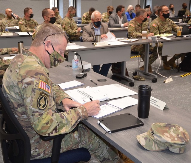 Maj. Gen. Chris Mohan, commanding general, U.S. Army Sustainment Command, takes notes during the Senior Leader Forum Oct. 19 held at Rock Island Arsenal, Illinois. (Photo by Staci-Jill Burnley, ASC Public Affairs)