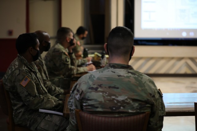 U.S. Army Soldiers assigned to the 3rd Infantry Division listen to a presentation during a Marne Think Tank meeting by Capt. Ben McFarlin, the Deputy Innovations officer for 3rd ID, Oct. 19, 2021, on Fort Stewart, Georgia. The Marne Think Tank looks for ways within the division to improve day-to-day operations at all organization levels, updating systems, enhancing effective training or creating more efficient operations and processes. (U.S. Army photo by Spc. Dre Stout)
