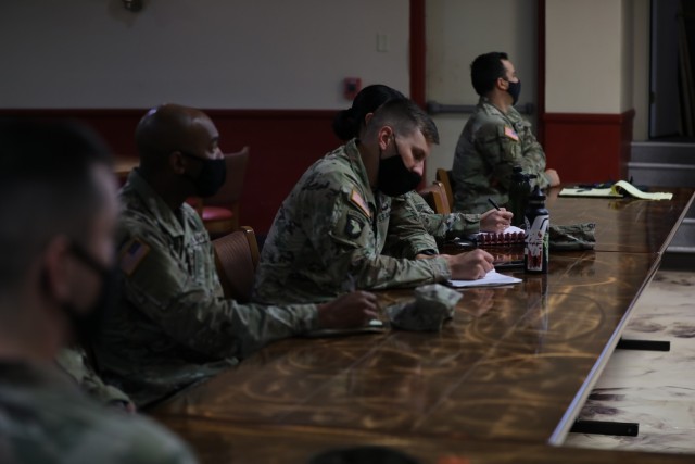 U.S. Army Soldiers assigned to 3rd Infantry Division conduct a meeting to discuss innovative solutions to enhance operations at the unit level, Oct. 19, 2021, on Fort Stewart, Georgia. The Marne Think Tank is an informal network of Soldiers within 3rd ID that helps them develop and learn technical skills as they improve their organization. (U.S. Army photo by Spc. Dre Stout)