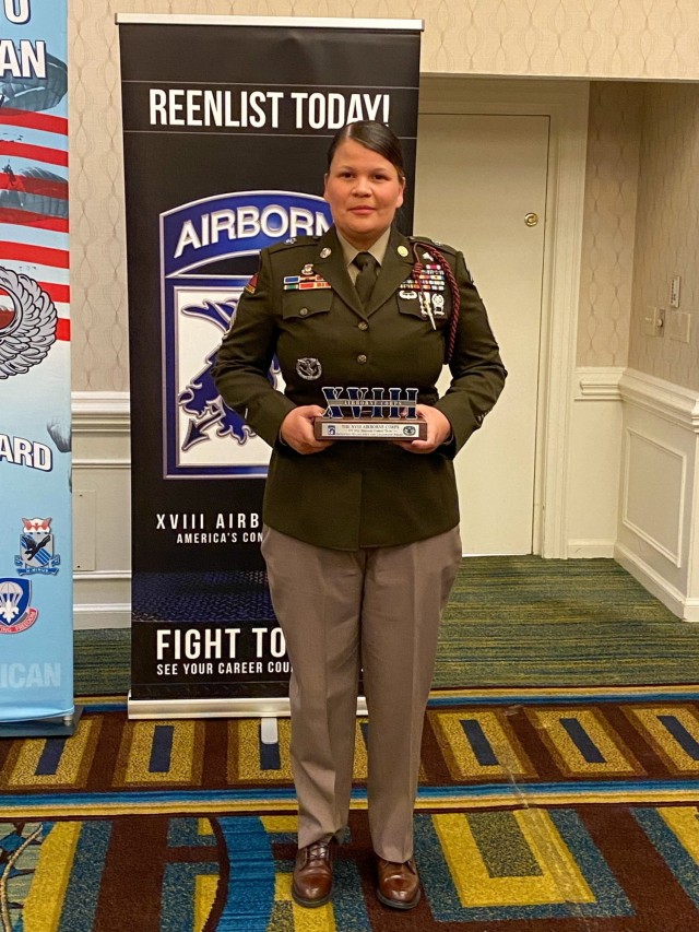 Sgt. 1st Class Yoleysi Garcia, the brigade career counselor for the "Spartan Brigade," 2nd Armor Brigade Combat Team, 3rd Infantry Division, holds her award after winning the XVIII Airborne Corps Retention Excellence and Leadership Award at Fort Story, Virginia, Oct. 21, 2021. The Army career counselor is the tip of the spear in meeting the Army’s end strength through matching the needs of the Army and the Soldier to facilitate a Soldier's career and meet the needs of the Army. (Courtesy Photo)