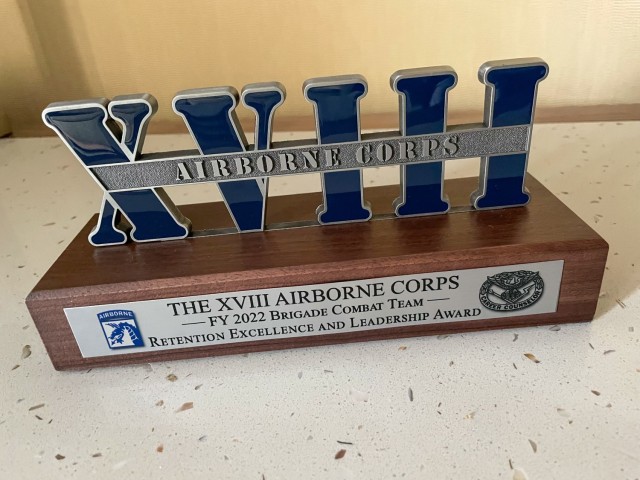 Sgt. 1st Class Yoleysi Garcia, the brigade career counselor for the "Spartan Brigade," 2nd Armor Brigade Combat Team, 3rd Infantry Division, displays the XVIII Airborne Corps Retention Excellence and Leadership Award she won on a table at Fort...