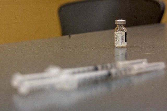 A vial and syringes for the COVID-19 vaccination at the Bluegrass Army Depot, in Richmond, KY, October 16, 2021. Soldiers and airmen received the vaccine as part of Operation Fortified Guardian for the Kentucky National Guard. (Kentucky Army National Guard photo by Sgt. Matt Damon)