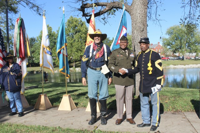 Col. Kelvin Swint thanks members of the Buffalo Soldier 9th/10th (Horse) Cavalry Association, Alexander / Madison Chapter of the KC area. In his presentation, Swint thanked those who paved the way with their never comprised integrity and purpose in military service.